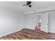 Bright bedroom with wood floors and ceiling fan at 126 E Henderson St, Salisbury, NC 28144