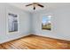 Bright bedroom featuring hardwood floors, natural light from the windows, and neutral wall color at 126 E Henderson St, Salisbury, NC 28144