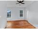 Sun-filled bedroom with hardwood floors and classic windows at 126 E Henderson St, Salisbury, NC 28144