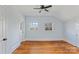 Charming bedroom with hardwood floors and a ceiling fan at 126 E Henderson St, Salisbury, NC 28144