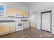 Bright kitchen with neutral cabinets, a complete set of appliances, and easy access to other rooms at 126 E Henderson St, Salisbury, NC 28144