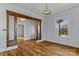 Light-filled living room featuring hardwood floors, decorative columns, and a large window at 126 E Henderson St, Salisbury, NC 28144
