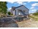 Exterior view of a blue house with a white door, stone steps and gravel at 126 E Henderson St, Salisbury, NC 28144