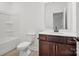 Well-lit bathroom featuring modern vanity with dark wood cabinets and chrome hardware at 1282 Kindness Nw Ct, Concord, NC 28027