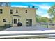 Backyard featuring a two-story home with a deck that walks out to the large lush lawn at 1308 Spring Lake Dr, Gastonia, NC 28054