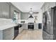 Well-lit kitchen with modern appliances, sleek countertops, and elegant cabinetry, ideal for cooking at 1308 Spring Lake Dr, Gastonia, NC 28054