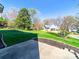 Expansive backyard with lush lawn and landscaping, perfect for outdoor activities at 14802 Rolling Sky Dr, Charlotte, NC 28273