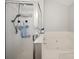 Shower and tub with glass door and tile at 14802 Rolling Sky Dr, Charlotte, NC 28273