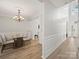 Open-concept dining room showcases modern decor and abundant natural light at 14802 Rolling Sky Dr, Charlotte, NC 28273