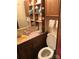 Bathroom featuring a toilet, vanity, mirror, and storage at 149 Deer Park Rd # D26/27, Mount Gilead, NC 27306