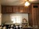 Bedroom with ample wooden storage cabinets and an end table with a lamp at 149 Deer Park Rd # D26/27, Mount Gilead, NC 27306