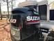 Close-up of a Suzuki 60 outboard boat motor, ensuring smooth sailing at 149 Deer Park Rd # D26/27, Mount Gilead, NC 27306