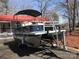 Pontoon boat ready for towing and a day of relaxation on the water at 149 Deer Park Rd # D26/27, Mount Gilead, NC 27306