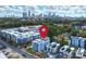 A vibrant community with rooftop decks and a city skyline backdrop, showcasing modern urban living at 1651 Duckworth Ave, Charlotte, NC 28208