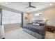 Relaxing main bedroom features a large bed, window, neutral palette, and ample natural light at 1651 Duckworth Ave, Charlotte, NC 28208