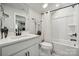 Bathroom featuring a vanity with black hardware, a large mirror, and a shower-tub combo at 2041 Mantle Ridge Dr, Indian Trail, NC 28079