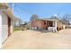 Spacious backyard with a hot tub and a generous patio area perfect for outdoor activities at 207 N Sims St, Kings Mountain, NC 28086