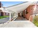 Attached carport providing covered parking and easy access to the home's entrance at 207 N Sims St, Kings Mountain, NC 28086