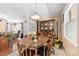 Bright dining area adjacent to living room, offering an inviting space for meals and gatherings at 207 N Sims St, Kings Mountain, NC 28086