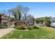 Charming brick home with well-maintained lawn, mature trees, and covered parking at 207 N Sims St, Kings Mountain, NC 28086