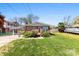 Attractive single-story home with green lawn, carport, and proximity to nearby trees at 207 N Sims St, Kings Mountain, NC 28086