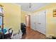Bright hallway with hardwood floors, ample closet space, and clean lines offers functionality and style at 207 N Sims St, Kings Mountain, NC 28086