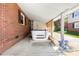 Hot tub located in the covered carport area, offering relaxation and privacy at 207 N Sims St, Kings Mountain, NC 28086