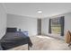 Bedroom with gray walls, wood-look flooring, a single bed, and a window with natural light at 2154 Withers Dr, Maiden, NC 28650