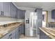 Modern kitchen featuring stainless steel appliances, kitchen island, and wood countertop at 2154 Withers Dr, Maiden, NC 28650
