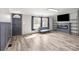 Inviting living room featuring wood floors, modern lighting, fireplace, and neutral paint at 2154 Withers Dr, Maiden, NC 28650