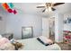 Bright bedroom with wood flooring, decor, and a view to the hall and kitchen at 217 Cedarhurst Ln, Clover, SC 29710