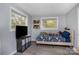 Cozy bedroom featuring a twin bed, lots of natural light, and wood look floors at 217 Cedarhurst Ln, Clover, SC 29710