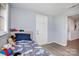 Bedroom featuring a twin bed, wood look floors, and neutral paint at 217 Cedarhurst Ln, Clover, SC 29710