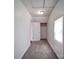 View of a small attic space with carpet, a window, and a closet at 2300 Kennesaw Dr, Charlotte, NC 28216