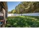 Well-manicured backyard with lush green lawn and a privacy fence, offering a serene outdoor space at 2401 Gelsinger Ave, Bessemer City, NC 28016