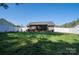 Expansive backyard with well-maintained lawn and a screened-in porch, ideal for outdoor activities at 2401 Gelsinger Ave, Bessemer City, NC 28016