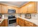 Well-equipped kitchen with stainless steel appliances and ample counter space at 2401 Gelsinger Ave, Bessemer City, NC 28016