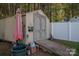 Outdoor shed with a ramp, providing convenient storage and accessibility for gardening tools and equipment at 2401 Gelsinger Ave, Bessemer City, NC 28016