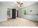 Bedroom featuring neutral carpet, a work station, and ceiling fan at 2717 Stockwood Dr, Gastonia, NC 28056