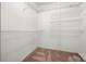 Walk-in closet features wire shelving for organized storage at 2717 Stockwood Dr, Gastonia, NC 28056