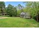 Two-story home on a spacious lawn surrounded by mature trees at 2717 Stockwood Dr, Gastonia, NC 28056