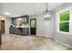 The kitchen features gray cabinetry and access to a backyard view at 2717 Stockwood Dr, Gastonia, NC 28056