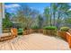 Spacious wooden back deck offering ample space for outdoor seating and entertaining at 2740 Cameron Commons Way, Matthews, NC 28104