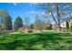 Large backyard with shed and mature trees, offering a private outdoor space at 2740 Cameron Commons Way, Matthews, NC 28104