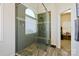 This is a large walk-in shower with a tiled seat and window at 2740 Cameron Commons Way, Matthews, NC 28104