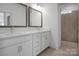 Bathroom featuring double sink vanity, modern fixtures, and ample cabinet space at 3054 Constitution Ln, Gastonia, NC 28056