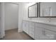 Bathroom featuring double sink vanity, modern fixtures, and ample counter space at 3054 Constitution Ln, Gastonia, NC 28056