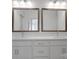 Bathroom featuring double sink vanity, modern fixtures, and ample counter space at 3054 Constitution Ln, Gastonia, NC 28056