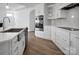Modern kitchen features stainless steel appliances and crisp white cabinetry at 3054 Constitution Ln, Gastonia, NC 28056