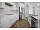 Modern kitchen features stainless steel appliances and crisp white cabinetry at 3054 Constitution Ln, Gastonia, NC 28056